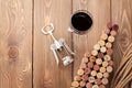 Wine bottle shaped corks, glass of wine and corkscrew Royalty Free Stock Photo