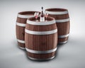 Wine bottle and wine glass on wodden barrel.
