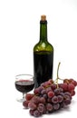 Wine bottle and wineglass with grape Royalty Free Stock Photo