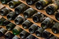 Wine bottles in the cellar, wine tasters, vintage wines Royalty Free Stock Photo