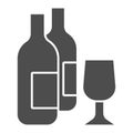 Wine bottles and glass solid icon. Two alcohol drink bottle and wineglass glyph style pictogram on white background Royalty Free Stock Photo