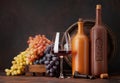 Wine bottles, grapes, glass of wine Royalty Free Stock Photo