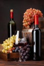 Wine bottles, grapes, glass of wine Royalty Free Stock Photo