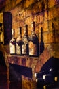 Wine bottles in a Hungarian wine cellar near Royalty Free Stock Photo