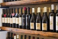 Wine bottles on the shelf, wine shop interior