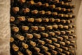 bottles stacked up in old wine cellar Royalty Free Stock Photo
