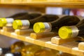 Wine bottles storage on wine rack in restaurant Royalty Free Stock Photo