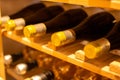 Wine bottles storage on wine rack in restaurant Royalty Free Stock Photo