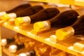 Wine bottles storage on wine rack in restaurant Royalty Free Stock Photo