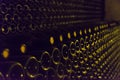 Wine bottles stored in the underground cellar for aging Royalty Free Stock Photo