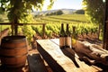 wine bottles on a wooden bench in a sunlit vineyard