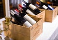 Wine bottles in wooden boxes. Royalty Free Stock Photo