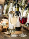 Wine bottles on the wooden shelf. Royalty Free Stock Photo