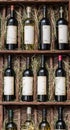 Wine bottles on a wooden shelf. Royalty Free Stock Photo