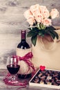 Wine and box of chocolates Royalty Free Stock Photo