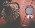 Wine carboy and wine glass Royalty Free Stock Photo