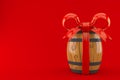 Wine cask with red ribbon