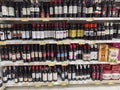 Wine cellar in super market shelf many bottles and wines