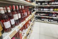 Wine cellar in super market shelf many bottles and wines