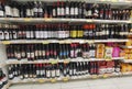 Wine cellar in super market shelf many bottles and wines