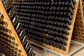 Wine or champagne bottles stored in the wine cellar Royalty Free Stock Photo