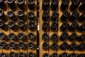 Wine or champagne bottles stored in the wine cellar Royalty Free Stock Photo