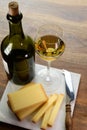 Wine and cheese pairing, local Comte cheese produced in the Franche-Comte region and special and characteristic yellow wine vin