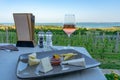 Wine, cheese table over the Lake Balaton on the hill Dinner, lunch, romantic date, picnic, eating on nature. Csopak wine Royalty Free Stock Photo