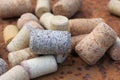 Wine cork from from semi-sweet wine, cork from white wine and cork from red wine among other corks Royalty Free Stock Photo