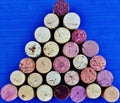 Wine corks arranged in a triangle. Royalty Free Stock Photo