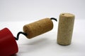 Wine corks and corkscrew isolated on a white background Royalty Free Stock Photo