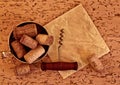 Wine corks and corkscrew on wooden background Royalty Free Stock Photo