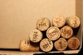 Wine corks with dates on paper background for your greeting text Royalty Free Stock Photo