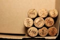 Wine corks with dates in retro style on paper background for your text Royalty Free Stock Photo