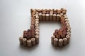 Wine corks music note on white background Royalty Free Stock Photo