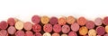 Wine corks panorama with copy space, overhead shot on a white background Royalty Free Stock Photo