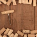 Wine corks and a vintage corkscrew on a dark wooden background with copy space, toned image Royalty Free Stock Photo