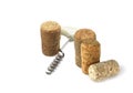 Wine corkscrew and wine corks on white background close up Royalty Free Stock Photo