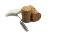 Wine corkscrew and wine corks on white background close up Royalty Free Stock Photo