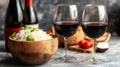 Wine  Dine Rice with Basil, Tomatoes, and Two Glasses of Red Wine Royalty Free Stock Photo