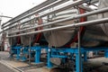 Wine Fermenting in huge vats. modern wine production plant