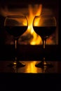 Wine by the fireplace Royalty Free Stock Photo