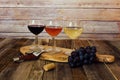 Wine flight with grapes, cork and bottle opener Royalty Free Stock Photo