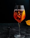 Wine glass with aperol spritz, italian alcoholic cocktail