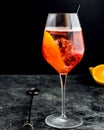 Wine glass with aperol spritz, italian alcoholic cocktail