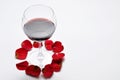 Wine glass and beautiful red rose isolated on white background. petals rose.Copy space Royalty Free Stock Photo