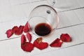 Wine glass and beautiful red rose isolated on white background. petals rose.Copy space Royalty Free Stock Photo