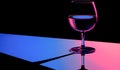 Wine glass on black background with side light. Professional photo concept. AI generated