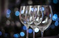 Wine glass with blue bokeh on background Royalty Free Stock Photo