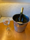 Wine glass and bucket of ice down wine